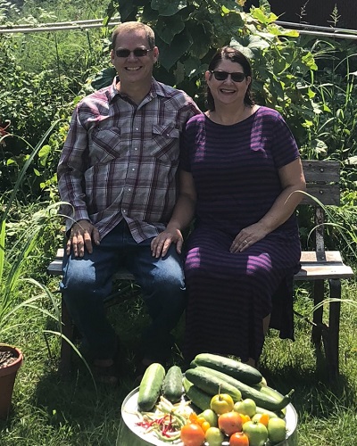 TSI's Terry Harstad and his wife Doris in their garden